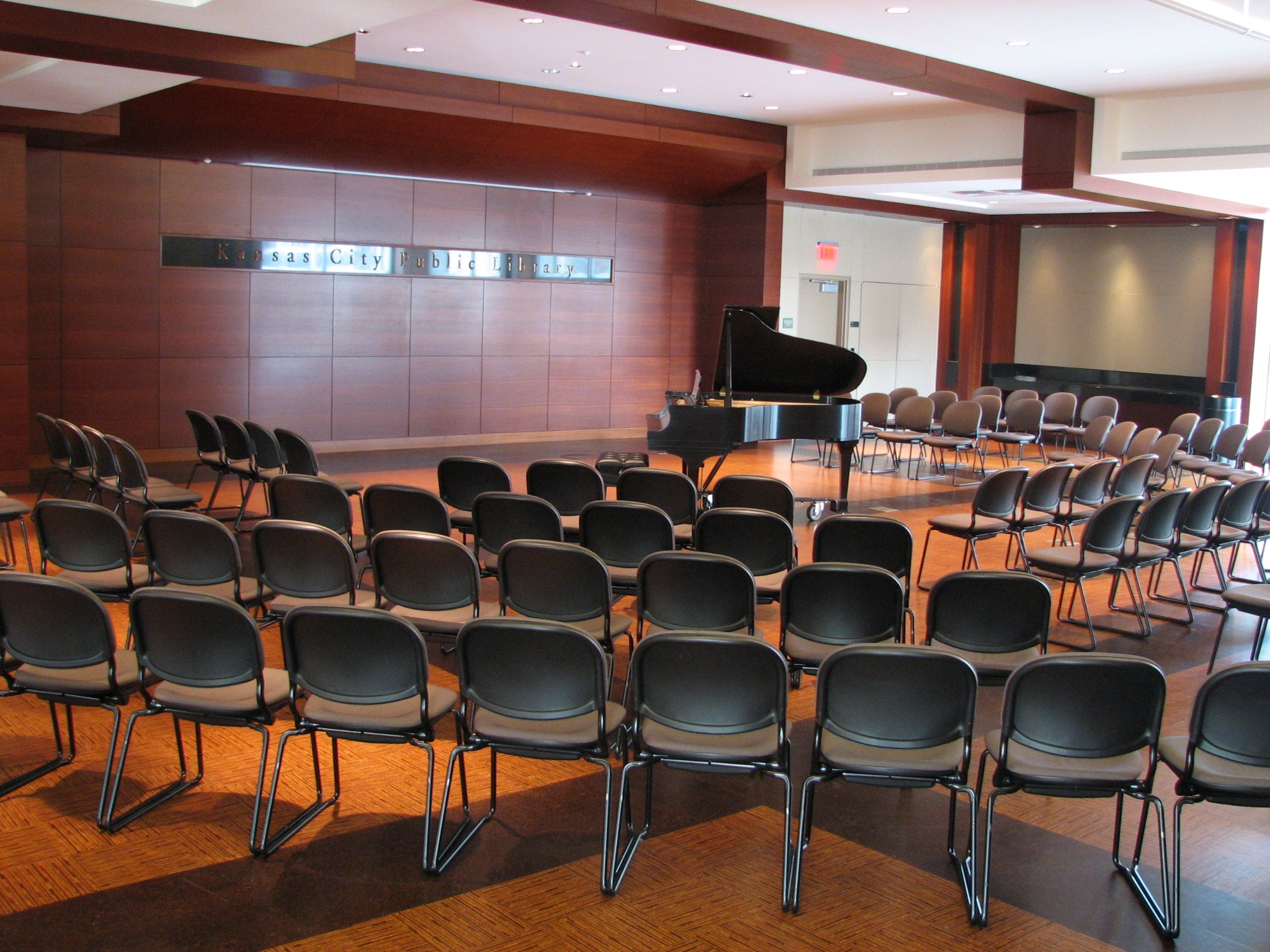chairs surrounding piano